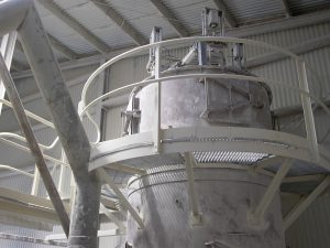 A decades-old mechanical shaker dust collector at Taylor’s Lime was retrofitted with a new pulse jet dust collector in the existing hopper vessel. A decades-old mechanical shaker dust collector at Taylor’s Lime was retrofitted with a new pulse jet dust collector in the existing hopper vessel.