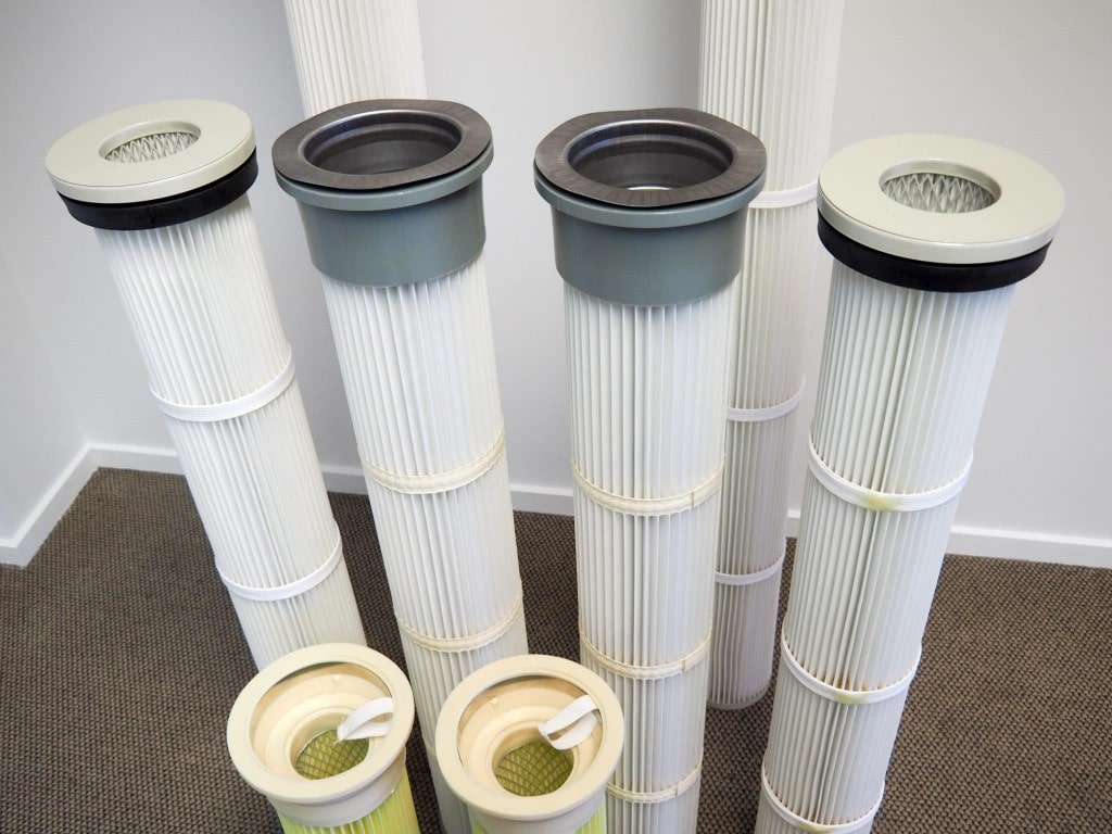 Pleated filter cartridges for industrial dust collectors