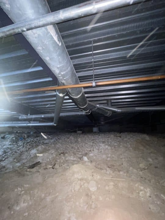 Existing underfloor ducting in Auckland secondary school woodworking workshop before DUSTEX dust extraction system upgrade