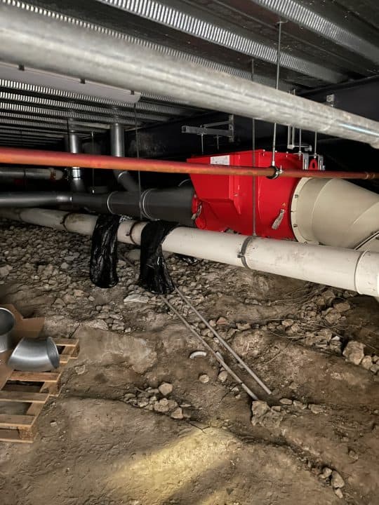 New underfloor ducting installed by DUSTEX connecting woodworking machines to upgraded dust extraction system at Auckland school