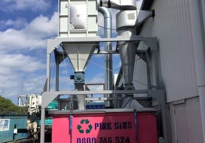 Industrial dust collector system with explosion protection at Jackson Industries.
