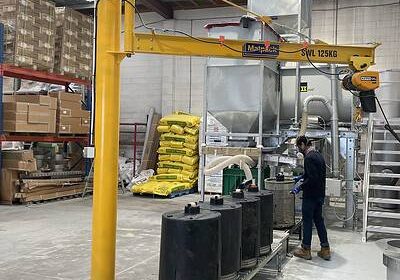 Completed Stormwater360 cartridge loading plant with conveyor, ducting and overhead crane